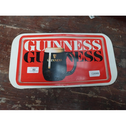 92 - Guinness tin plate drink�s tray. {20 cm H x 27 cm W}.