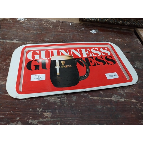 92 - Guinness tin plate drink�s tray. {20 cm H x 27 cm W}.