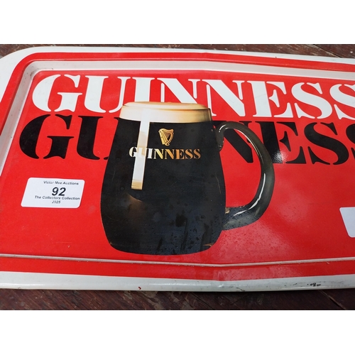 92 - Guinness tin plate drink�s tray. {20 cm H x 27 cm W}.