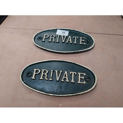 94 - Two cast iron Private door plaques. {9 cm H x 19 cm W}.