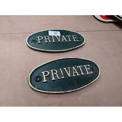 94 - Two cast iron Private door plaques. {9 cm H x 19 cm W}.