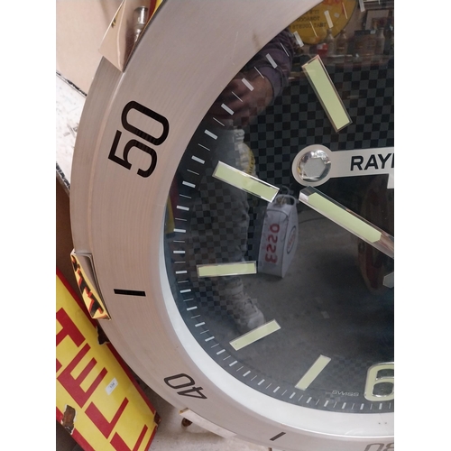 832 - Raymond Weil Shop display advertising clock on stand. {110 cm H x 90 cm W x 27 cm D}.