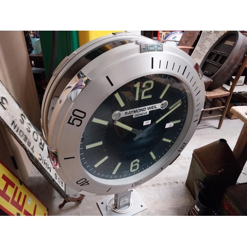 832 - Raymond Weil Shop display advertising clock on stand. {110 cm H x 90 cm W x 27 cm D}.