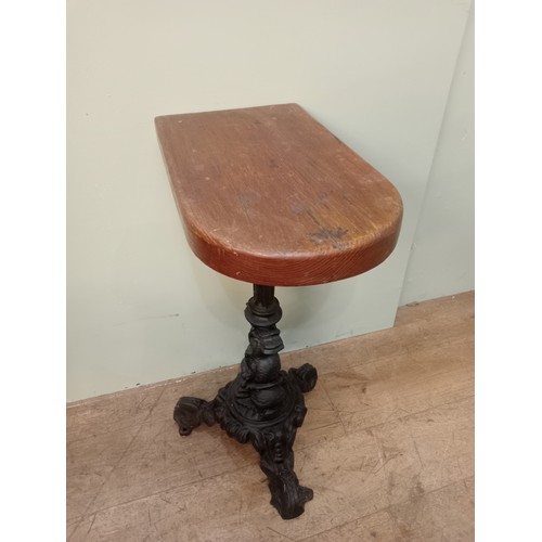 249 - Cast iron and mahogany pub table with D end top. H 73cm x W 29cm x D 50cm. NOT AVAILABLE TO VIEW IN ... 