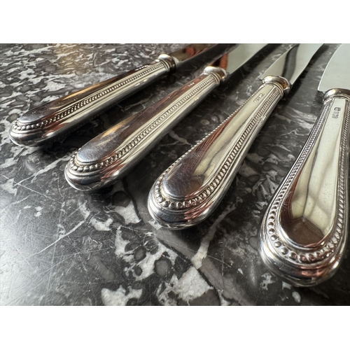 1017 - Set of six English silver table knives, bead pattern. Hallmarked in Sheffield 1975. Makers: William ... 