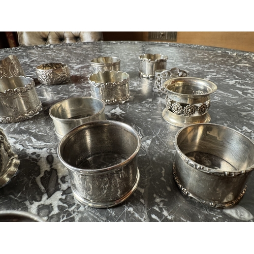 1028 - Collection of eighteen  English silver napkin rings. Hallmarked in Birmingham { 13 }, Sheffield { 2 ... 