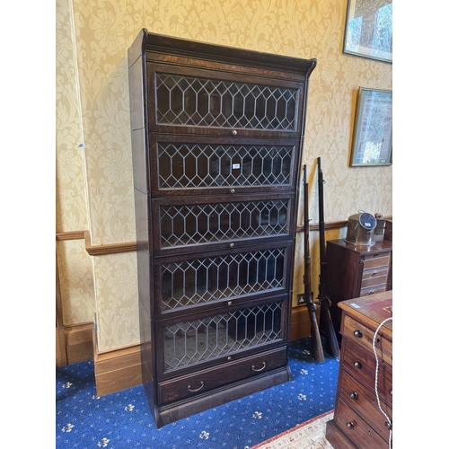 103 - Early 20th C. oak stackable bookcase with five leaded glass doors in the Globe Wernicke manner {187c... 