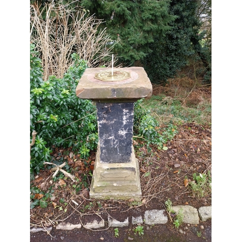 1047 - 19th C. Sandstone sundial with later brass dial. {128 cm H x 47 cm W x 47 cm D}.