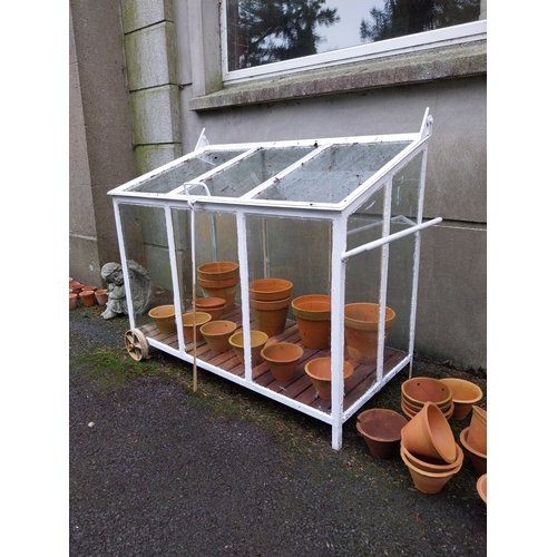 1056 - Good quality wrought iron portable mini greenhouse on wheels with lift up lid. {107 cm H x 123 cm W ... 