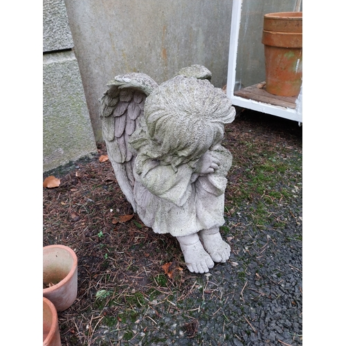 1059 - Weathered composition model of Angel. {32 cm H x 24 cm W x 30 cm D}.