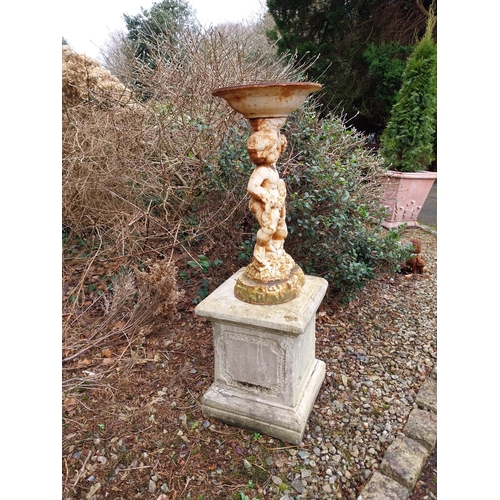 1074 - Cast iron bird bath on composition stand. {114 cm H x 39 cm W x 39 cm D}.