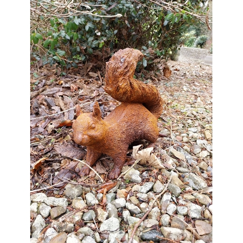 1076 - Cast iron model of Squirrel. {27 cm H x 38 cm W x 12 cm D}.