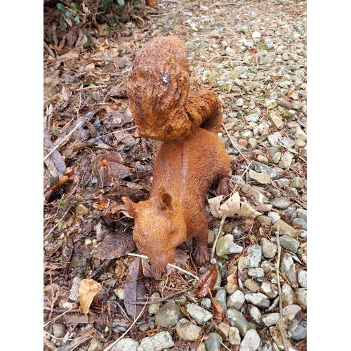 1076 - Cast iron model of Squirrel. {27 cm H x 38 cm W x 12 cm D}.