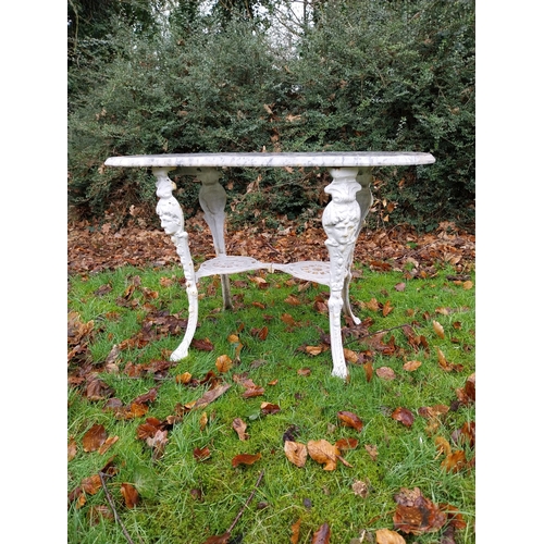 1078 - Cast iron garden table with marble top. {56 cm H x 102 cm W x 51 cm D}.