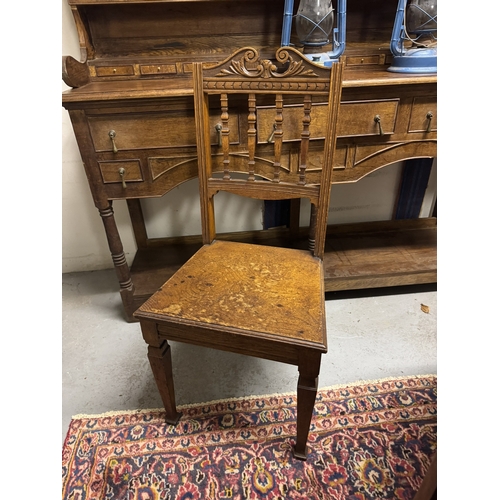 1095 - Edwardian oak hall chair. { 101cm H X 46cm W X 39cm D }.