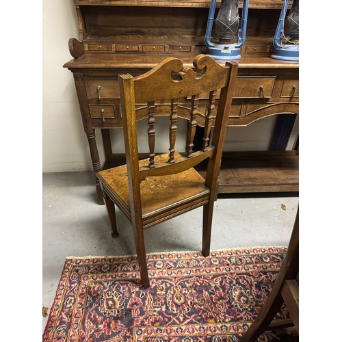 1095 - Edwardian oak hall chair. { 101cm H X 46cm W X 39cm D }.