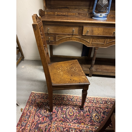 1095 - Edwardian oak hall chair. { 101cm H X 46cm W X 39cm D }.