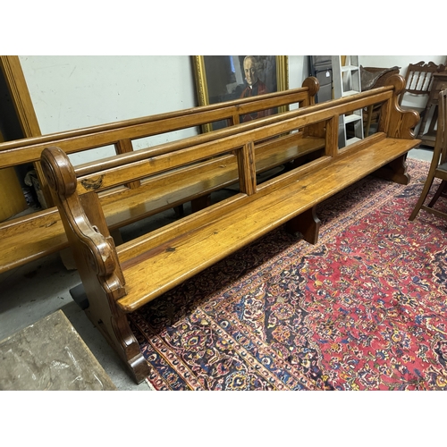 1102 - 19th. C. pitch pine open backed pew. { 96cm H X  295cm W X 42cm D }.