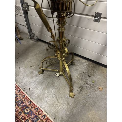 1106 - 19th. C. brass Ecclesiastical three tier candle stand, raised on pad feet. { 155cm H X 70cm Dia }.