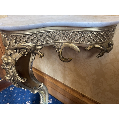 111 - 20th C. Gilt console table. {84 cm H x 74 cm W x 39 cm D}.