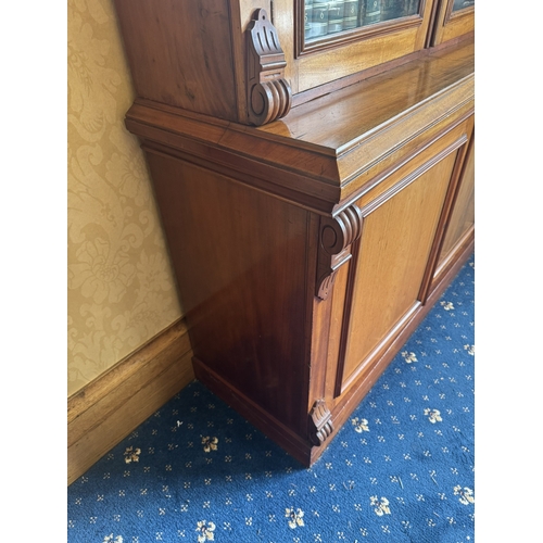 115 - Victorian mahogany three door bookcase with three glazed doors above three blind doors. {245 cm H x ... 