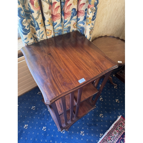 138 - Edwardian mahogany revolving bookcase in the Victorian style. {91 cm H x 53 cm W x 53 cm D}.