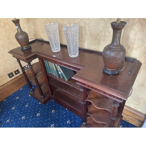 143 - William IV mahogany open floor bookcase raised on reeded columns and platform base. {93 cm H x 155 c... 