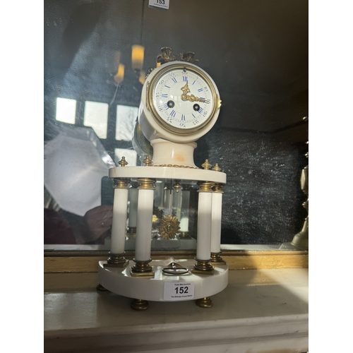 152 - 19th C. French marble clock with ormolu mounts and enamel dial. {37 cm H x 20 cm W x 10 cm D].