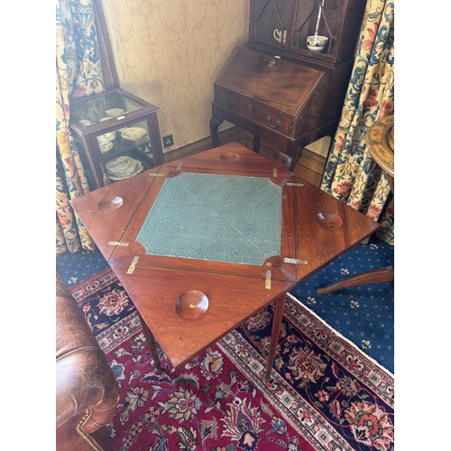 166 - Edwardian mahogany and inlaid satinwood envelope card table raised on square tapered legs. {77 cm H ... 