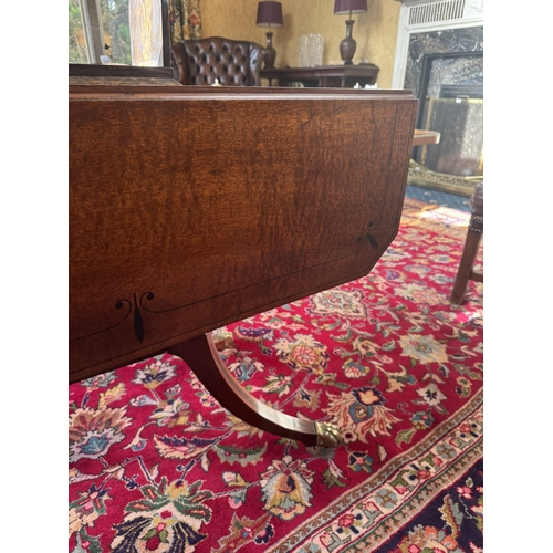 168 - Regency mahogany and ebonised sofa table, raised on turned column and four outswept feet. {70 cm H x... 