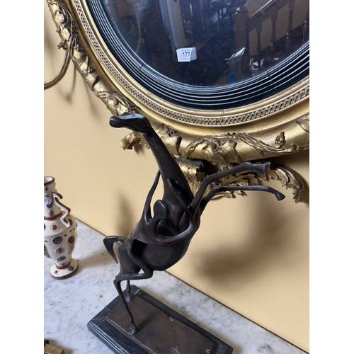 179 - Bronze Horse and Rider mounted  on marble plinth in the manner of Salvador Dali. {53 cm H x 36 cm W ... 