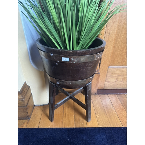 187 - Edwardian brass bound oak jardiniere on stand. {64 cm H x 35 cm Dia.}.