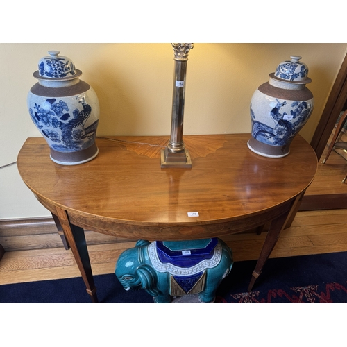 190 - Pair of exceptional quality Edwardian mahogany and satinwood demi lune console tables, raised on squ... 