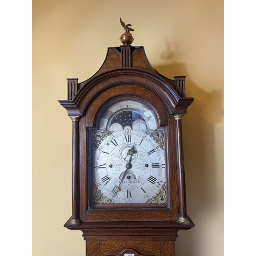 193 - Rare 19th C. Oak Regulator long cased clock with brass and silvered rolling arched silver dial by Jo... 