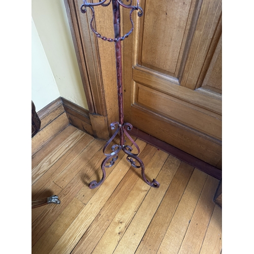 199 - Unusual decorative wrought iron house bell, raised on single column with tripod base. {176 cm H x 50... 