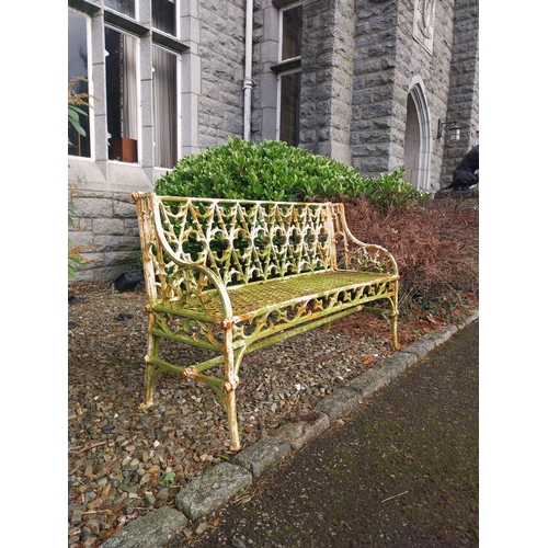 2 - Gothic cast iron three seater garden bench. {83 cm H x 136 cm W x 45 cm D}.