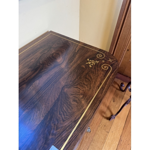 202 - Good quality brass and inlaid rosewood card table, raised on turned column and four outswept feet. {... 