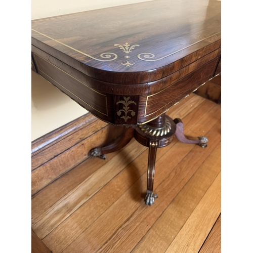 202 - Good quality brass and inlaid rosewood card table, raised on turned column and four outswept feet. {... 