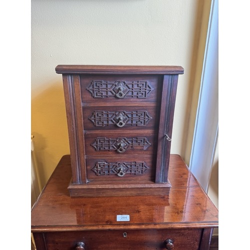 203 - Edwardian mahogany collector�s cabinet. {44 cm H x 36 cm W x 24 cm D}.