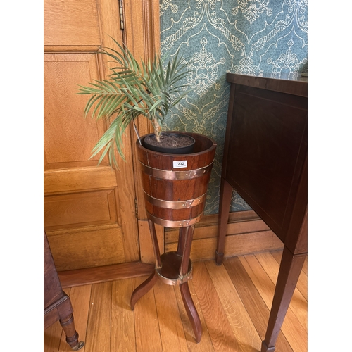 232 - Edwardian oak brass bound jardiniere, raised on three outswept legs. {77 cm H x 35 cm Dia.}.