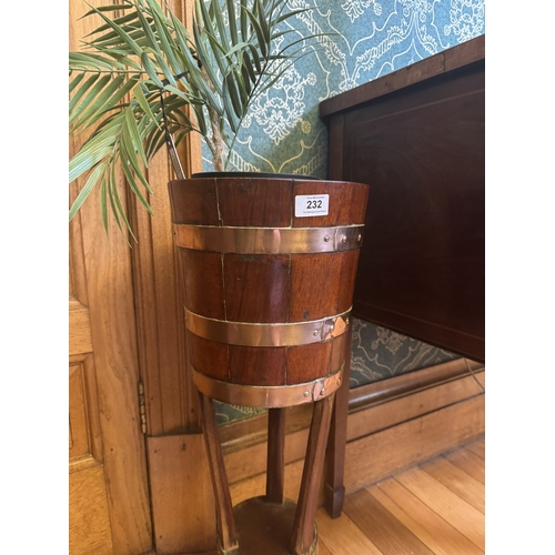 232 - Edwardian oak brass bound jardiniere, raised on three outswept legs. {77 cm H x 35 cm Dia.}.