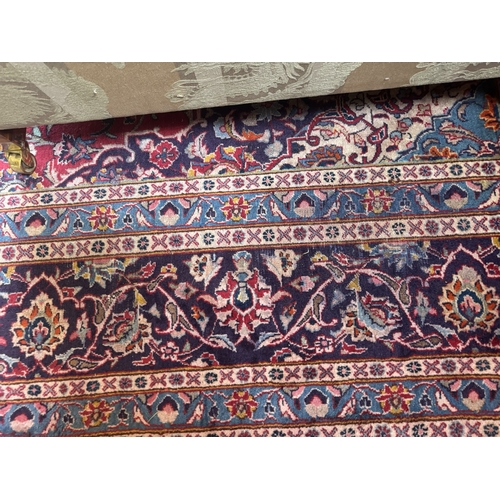 254 - Decorative Persian Mashad carpet. {381 cm L x 283 cm W}.