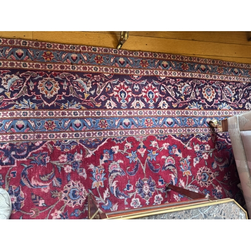 254 - Decorative Persian Mashad carpet. {381 cm L x 283 cm W}.