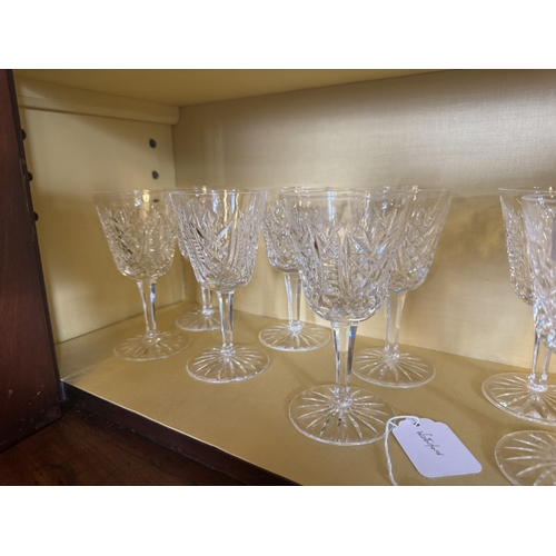 258 - Twelve Waterford crystal wine glasses. {15 cm H x 8 cm Dia}.