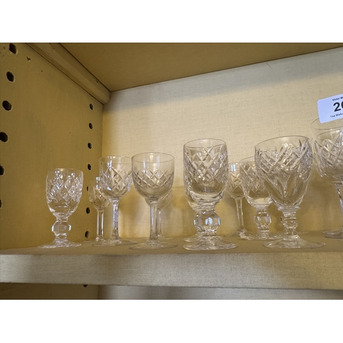 262 - Two shelves of miscellaneous cut crstal glasses.