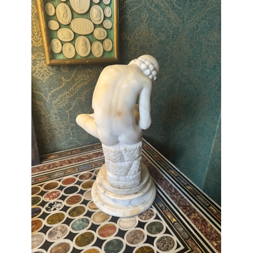 278 - 19th C. Carved alabaster figure of Boy pulling a Thorn. {36 cm H x 20 cm W x 17 cm D}.