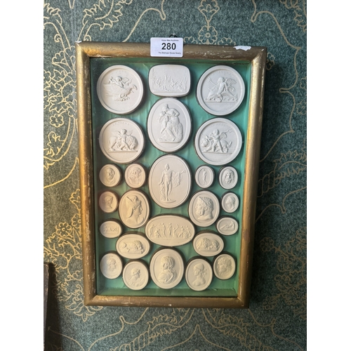 280 - Rare framed set of Italian Grand Tour intaglios. {35 cm H x 23 cm W}.