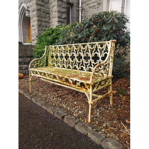 3 - Gothic cast iron three seater garden bench. {83 cm H x 136 cm W x 45 cm D}.