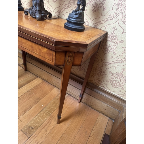 301 - 19th C. Satinwood crossbanded turn over leaf card table, raised on square tapered legs. {76 cm H x 9... 