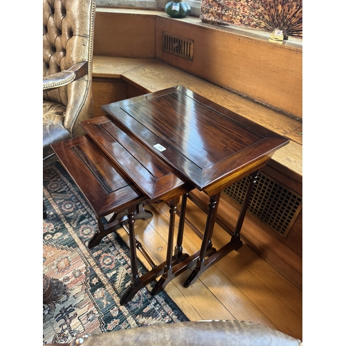 324 - Nest of three mahogany tables, raised on turned columns in the Victorian style. {59 cm H x  56 cm W ... 